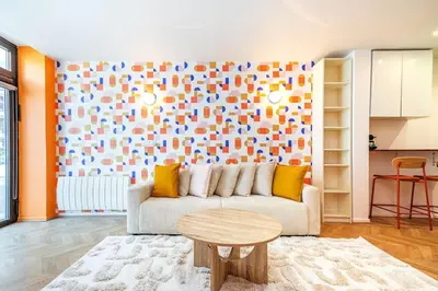 Coin salon dans l'établissement Appartement Coloré aux portes des Buttes Chaumont