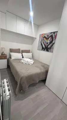 Un ou plusieurs lits dans un hébergement de l'établissement Bel Appartement a 5 minutes du Louvre