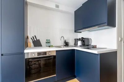 Cuisine ou kitchenette dans l'établissement Close to Center of Paris I Fully equipped