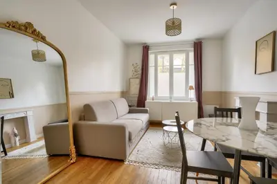 Coin salon dans l'établissement Urban oasis 1BR - Paris