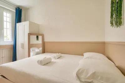 Un ou plusieurs lits dans un hébergement de l'établissement Urban oasis 1BR - Paris