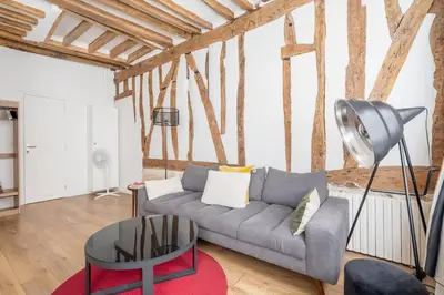 Coin salon dans l'établissement ParisConciergerie - 1BR apartment with AC