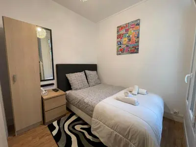 Un ou plusieurs lits dans un hébergement de l'établissement Dame de fer apartment
