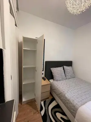 Un ou plusieurs lits dans un hébergement de l'établissement Dame de fer apartment