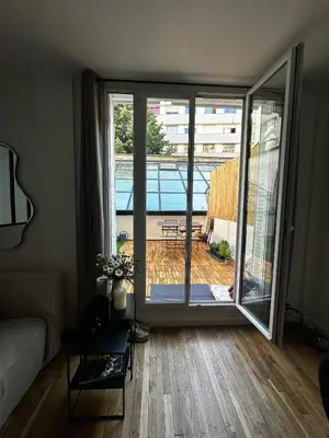 Coin salon dans l'établissement Appartement avec terrasse