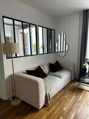 Un ou plusieurs lits dans un hébergement de l'établissement Appartement avec terrasse