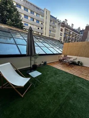 Jardin de l'établissement Appartement avec terrasse