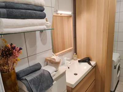 Salle de bains dans l'établissement Nid douillet et lumineux