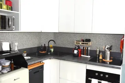 Cuisine ou kitchenette dans l'établissement Nid douillet et lumineux