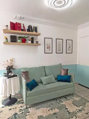 Coin salon dans l'établissement Nid douillet et lumineux