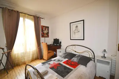Un ou plusieurs lits dans un hébergement de l'établissement Great apartment near rue Daguerre - pls book on air-bnb