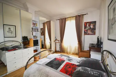 Un ou plusieurs lits dans un hébergement de l'établissement Great apartment near rue Daguerre - pls book on air-bnb