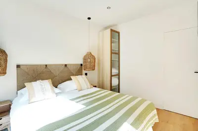 Un ou plusieurs lits dans un hébergement de l'établissement Refurbished Apartment - 2BD-8P - Place D'Italie