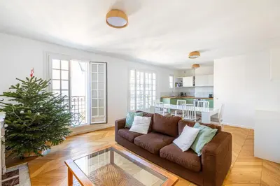 Coin salon dans l'établissement GuestReady - Confort familial avec balcon