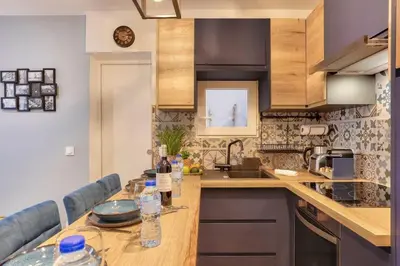 Cuisine ou kitchenette dans l'établissement Bel appartement - 2 chambres au centre de Paris