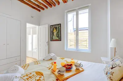 Un ou plusieurs lits dans un hébergement de l'établissement Bluestay 281 - Superbe appartement avec terrasse
