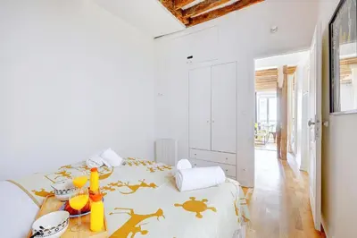 Un ou plusieurs lits dans un hébergement de l'établissement Bluestay 281 - Superbe appartement avec terrasse