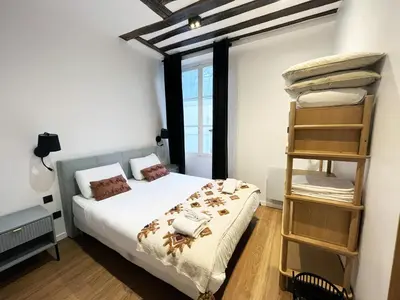 Un ou plusieurs lits dans un hébergement de l'établissement Urban Flat 108 - Stunning 4 BDR Flat in Paris