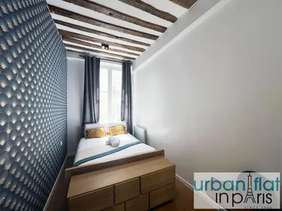 Un ou plusieurs lits dans un hébergement de l'établissement Urban Flat 108 - Stunning 4 BDR Flat in Paris