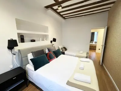 Un ou plusieurs lits dans un hébergement de l'établissement Urban Flat 108 - Stunning 4 BDR Flat in Paris