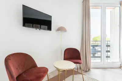 Télévision ou salle de divertissement dans l'établissement Studio lumineux Paris Est -II