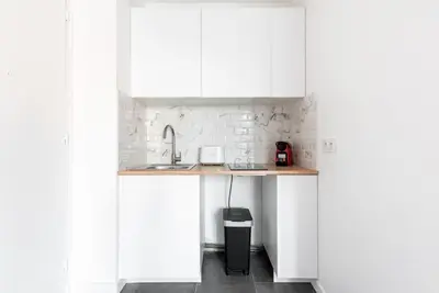 Cuisine ou kitchenette dans l'établissement Studio lumineux Paris Est -II