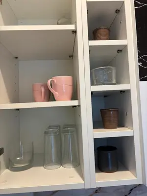 Cuisine ou kitchenette dans l'établissement Appartement des Champs Elysées