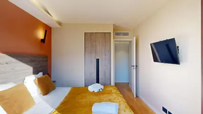 Un ou plusieurs lits dans un hébergement de l'établissement Bluestay 53 - Appartement Chic au Cœur de Paris
