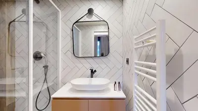 Salle de bains dans l'établissement Bluestay 53 - Appartement Chic au Cœur de Paris