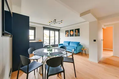 Coin salon dans l'établissement Bluestay 53 - Appartement Chic au Cœur de Paris