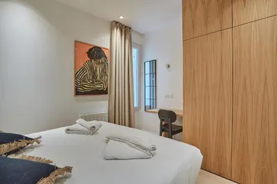 Un ou plusieurs lits dans un hébergement de l'établissement Apartment Le Marais Centre de Paris by Studio Prestige