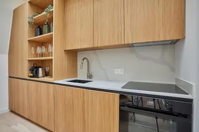 Cuisine ou kitchenette dans l'établissement Apartment Le Marais Centre de Paris by Studio Prestige