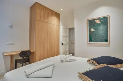 Un ou plusieurs lits dans un hébergement de l'établissement Apartment Le Marais Centre de Paris by Studio Prestige
