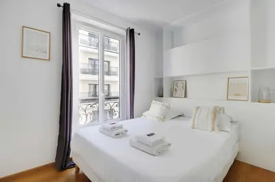 Un ou plusieurs lits dans un hébergement de l'établissement GoodGuest- Paris Levallois Bail Mobilité