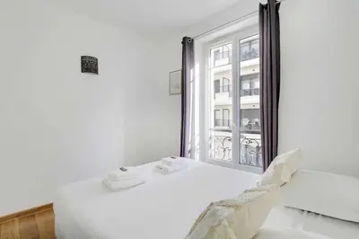 Un ou plusieurs lits dans un hébergement de l'établissement GoodGuest- Paris Levallois Bail Mobilité