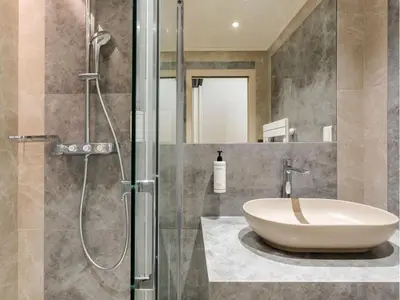 Salle de bains dans l'établissement Merveil - Signature Suite - Marais - Archives II