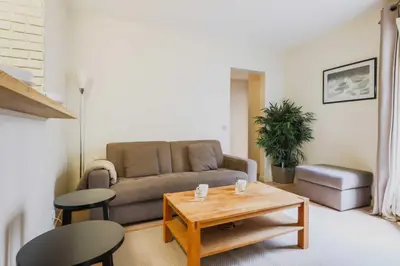 Coin salon dans l'établissement Modern flat - 1BD-4P - Parc Monceau