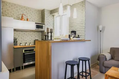 Cuisine ou kitchenette dans l'établissement Modern flat - 1BD-4P - Parc Monceau