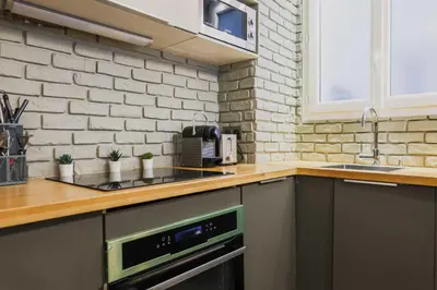 Cuisine ou kitchenette dans l'établissement Modern flat - 1BD-4P - Parc Monceau