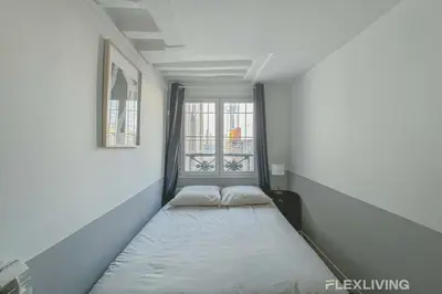Un ou plusieurs lits dans un hébergement de l'établissement Flexliving - room - Lune