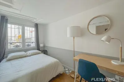 Un ou plusieurs lits dans un hébergement de l'établissement Flexliving - room - Lune