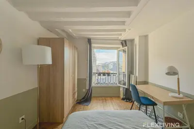 Un ou plusieurs lits dans un hébergement de l'établissement Flexliving - room - Lune