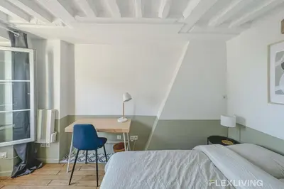 Un ou plusieurs lits dans un hébergement de l'établissement Flexliving - room - Lune