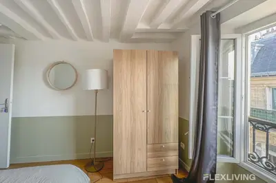 Un ou plusieurs lits dans un hébergement de l'établissement Flexliving - room - Lune