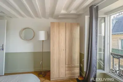 Un ou plusieurs lits dans un hébergement de l'établissement Flexliving - whole flat - Lune