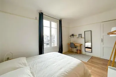 Un ou plusieurs lits dans un hébergement de l'établissement Flexliving - whole flate - Entrepreneur