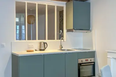 Cuisine ou kitchenette dans l'établissement Flexliving - studio - 3 Portes