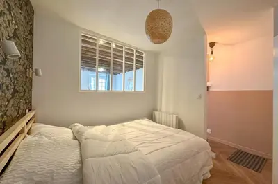 Un ou plusieurs lits dans un hébergement de l'établissement Flexliving - studio - 3 Portes
