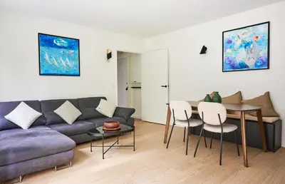 Coin salon dans l'établissement Beautiful central apartment near Eiffel Tower and Invalides