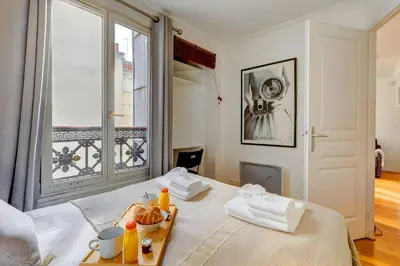 Un ou plusieurs lits dans un hébergement de l'établissement Bluestay 238 - Superbe appartement à Paris